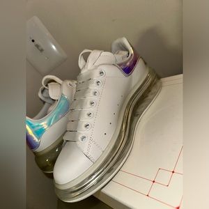 Women’s Alexander McQueen white with silver/metallic black.